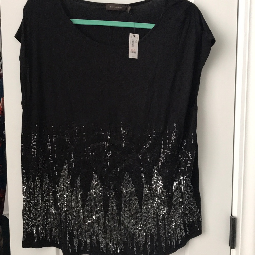 The limited black sequin blouse